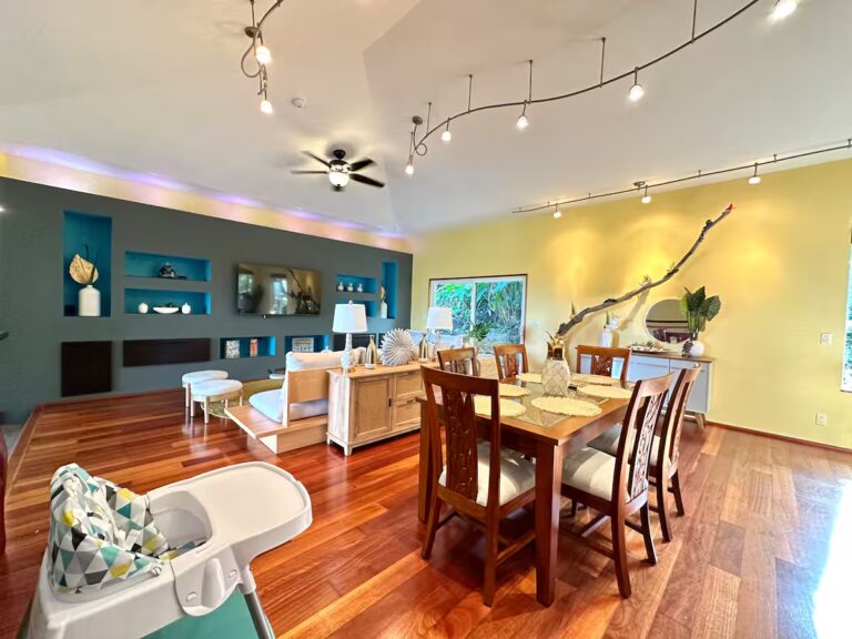 Dining table beside the open living room at H5 Blue Lagoon of Kona Estate