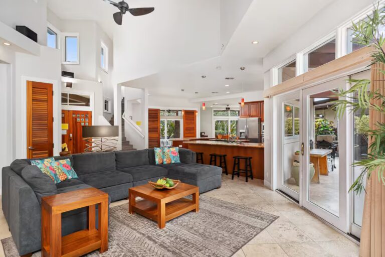 View from the living room toward the kitchen at Kona Luxury Estate