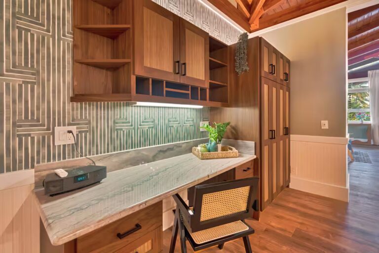 Built-in desk and wood storage cabinets at Spacious Kona Retreat