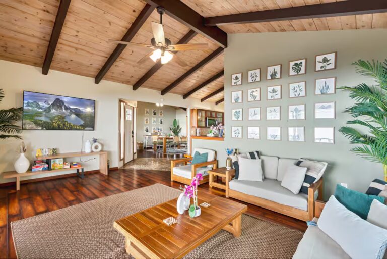 Living room with exposed timber ceiling at H4 in Holualoa