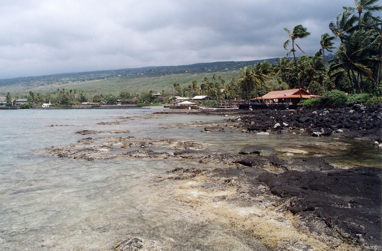 Rocky shoreline and shallow water at Kahaluu Bay