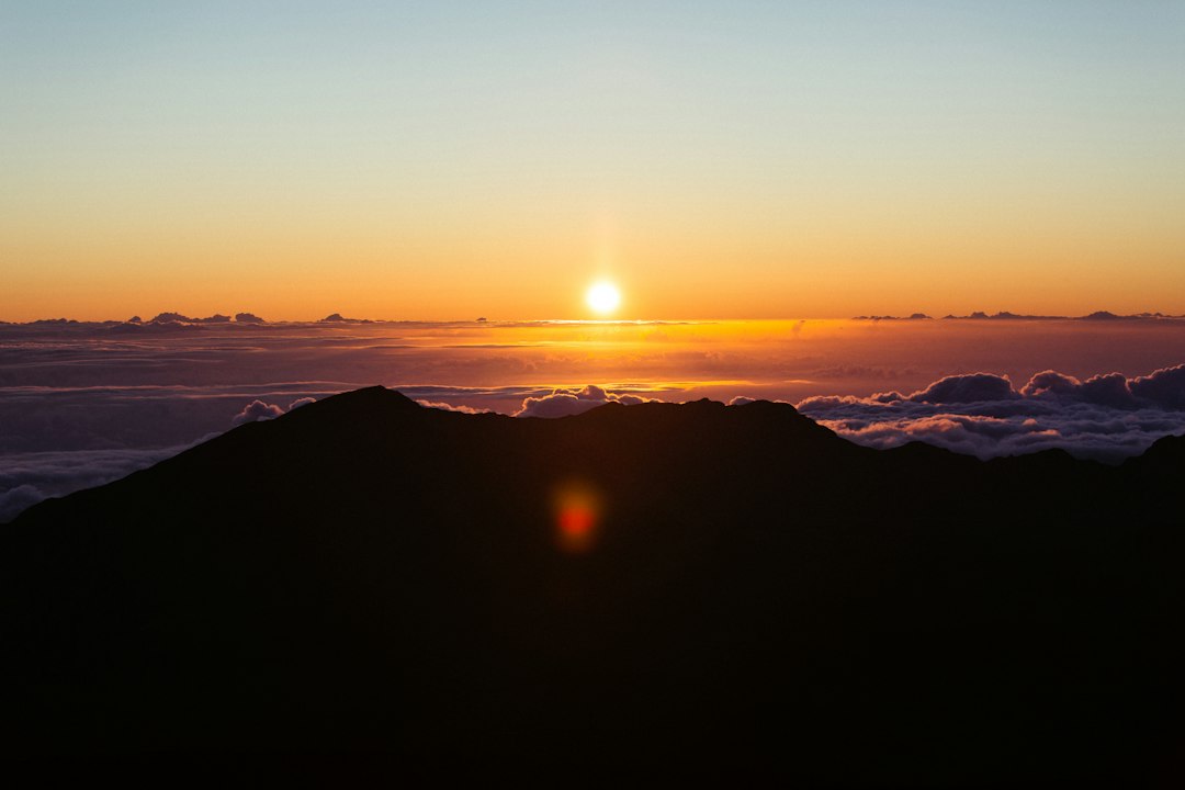 Sunrise above clouds at Haleakala