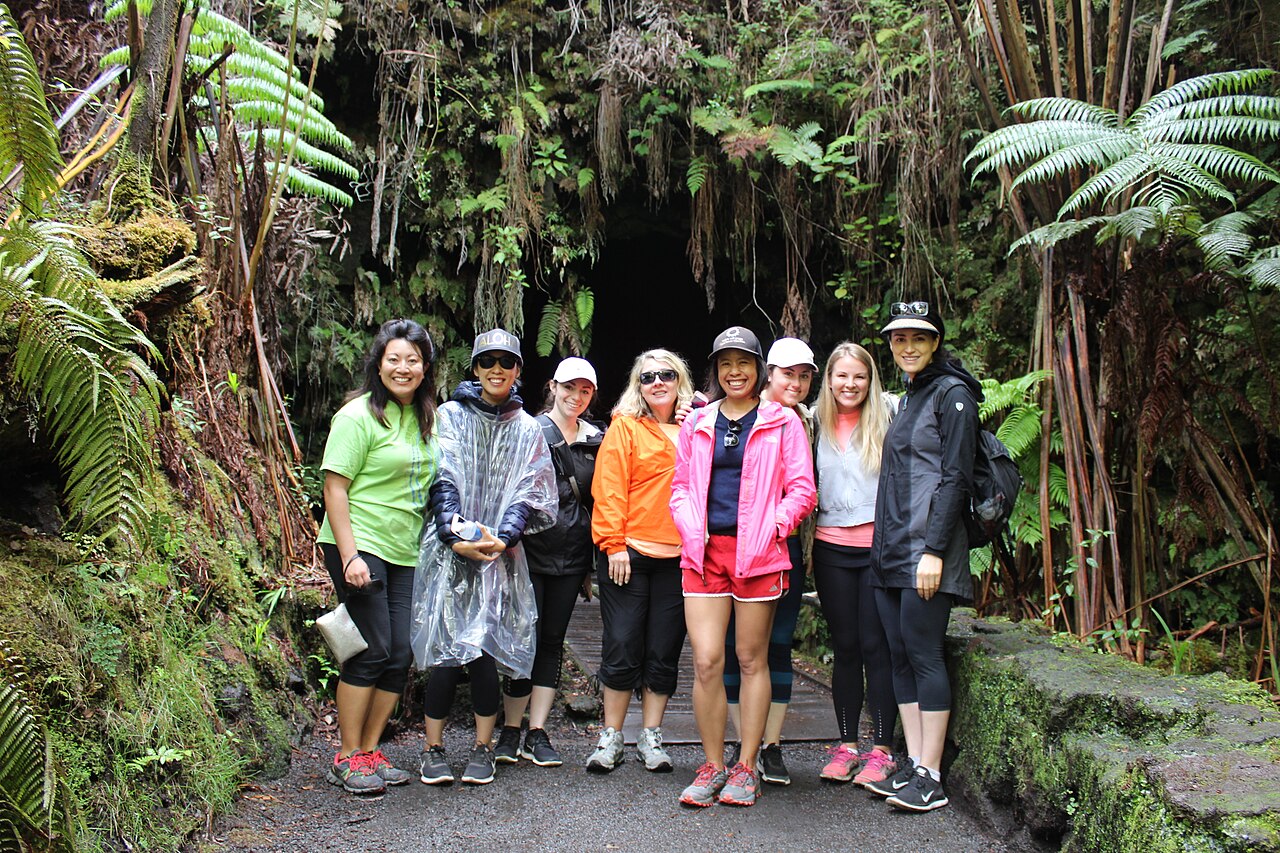 Visitors beside the entrance to Nahuku Thurston Lava Tube