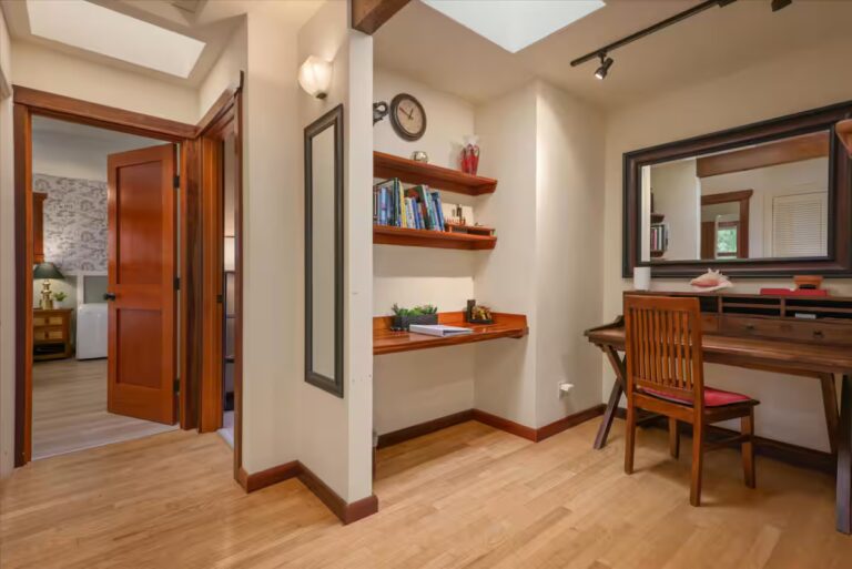 Dressing area with shelves and a built-in vanity desk at H6 Dolphin Bay Estate