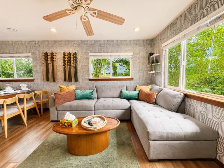 Living room and dining area at HI8 Kona Vacation Home